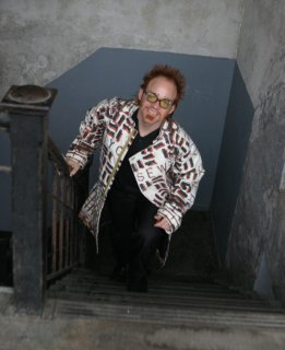 Wearing coat<br>Walking up Stairs